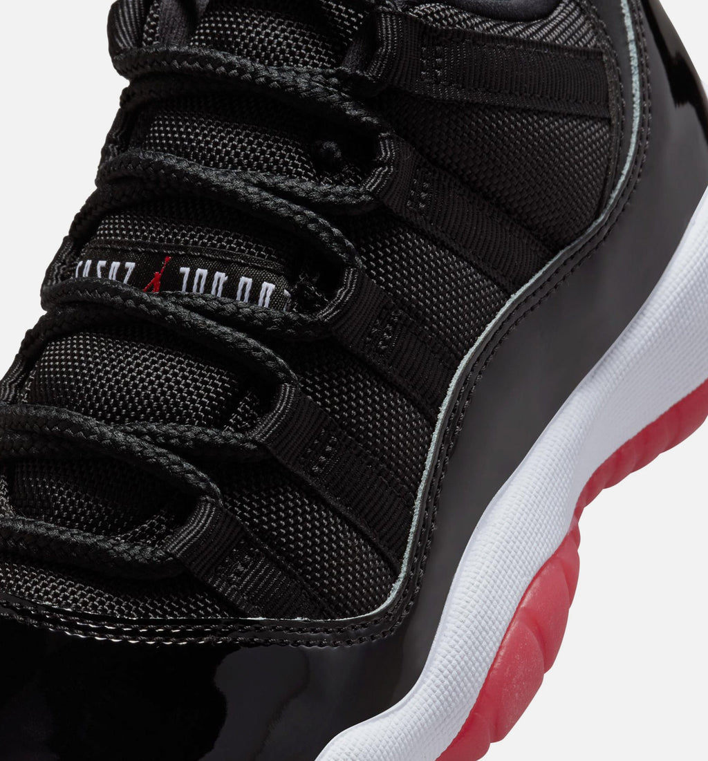Air Jordan 11 Retro Bred Grade School 生活方式运动鞋 - 黑色大学红白色